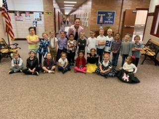 Mrs. Toeulupe's Kinder kids posing for a class picture in their 50's getup 