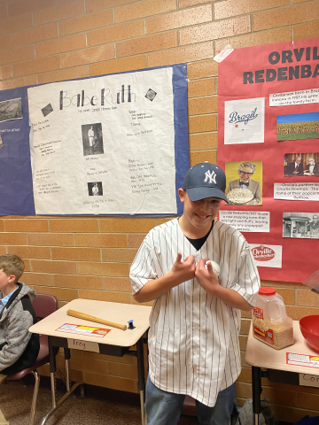 Trey presenting as Babe Ruth in the wax museum