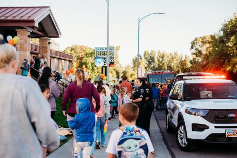 parents and students attend walk/roll to school event