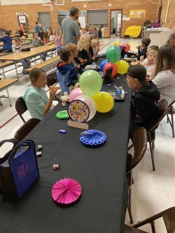 Mrs. Walker Eating with students who had birthdays in September