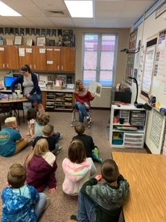 Parents reading Christmas stories in Mrs. Gull's class