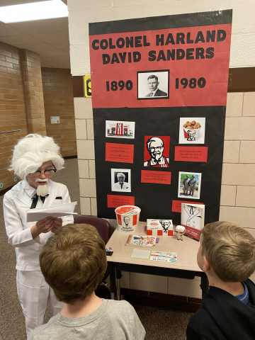 Russell Beasley presenting as Colonel Harland David Sanders in the wax museum
