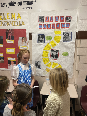 Ruby presenting as Judy Garland in the wax museum