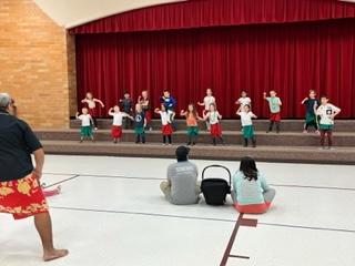 Kindergarten performing a Luau Dance