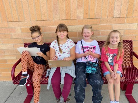 4th graders making friends on the buddy bench!