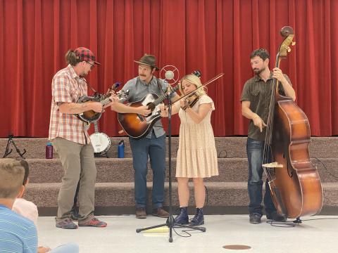 Fiddle Tunes String Band teaching about each instrument and their sounds