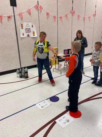 Students playing ring toss 