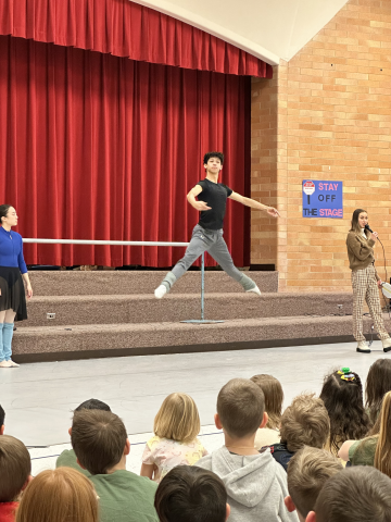 Ballet West performers teaching Park View students how they jump
