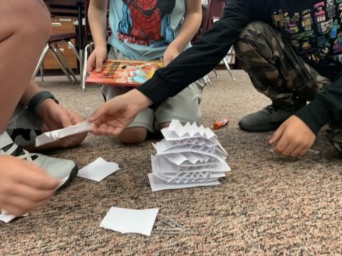 Paper tower structure, using what they know about shapes
