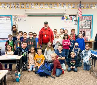 Scott Hammond Search and Rescue volunteer with Mrs. Jasperson's literacy class.
